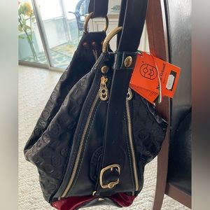 NWT Marino Orlandi Italy converts to sling Black smooth leather embossed logo.